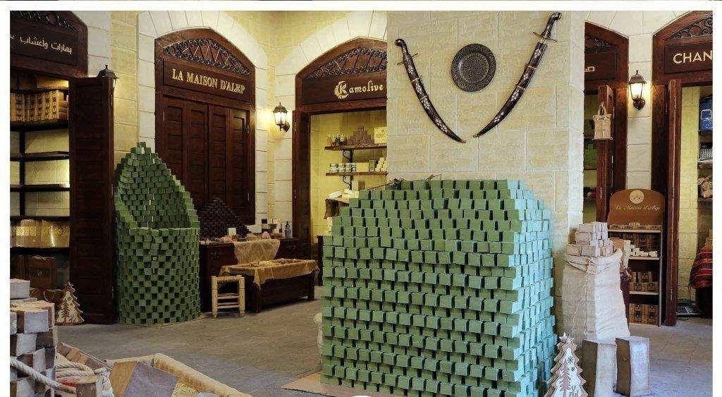 Green laurel soap stacked in the showroom